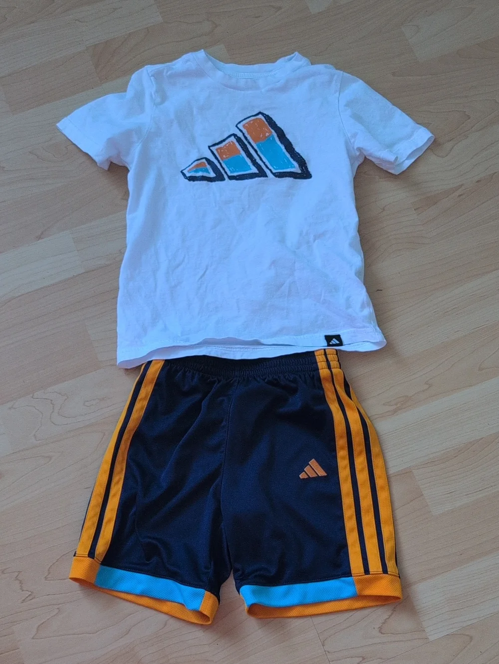 adidas White Tee with Orange & Aqua Logo and Navy Athletic Shorts